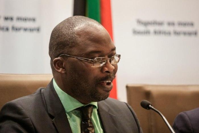 South African Justice Minister Michael Masutha gives a press briefing in Pretoria on October 21, 2016 regarding South Africa's decision to withdraw from the International Criminal Court