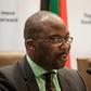 South African Justice Minister Michael Masutha gives a press briefing in Pretoria on October 21, 2016 regarding South Africa's decision to withdraw from the International Criminal Court