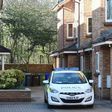 A police car parked outside a house in an estate in West Didsbury, a suburb of Manchester, north-west England, connected to Westminster terrorist Khalid Masood which was raided overnight by anti-terror police on March 24, 2017
