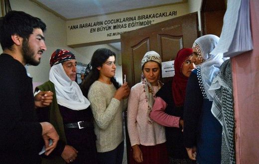 Voters queue to cast Turkish referendum ballots in the main Kurdish city of Diyarbakir