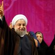 Iranian President Hassan Rouhani, who has comfortably won a second term, gestures during a campaign rally in Tehran on May 9, 2017