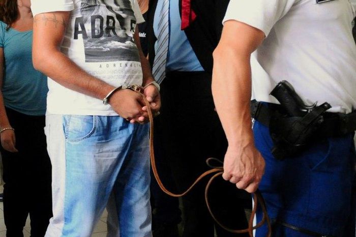 A suspect in the deaths of 71 migrants found in an abandoned truck in Austria appears in court in Hungary in August 2015