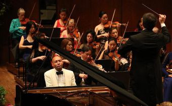 A pianist swings hard in both classical and jazz