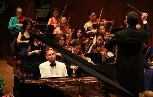 A pianist swings hard in both classical and jazz