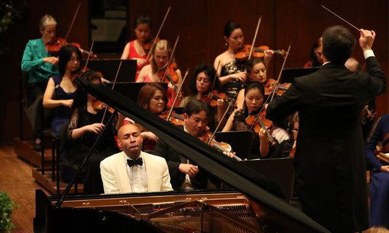 A pianist swings hard in both classical and jazz