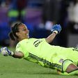 Lyon's goalkeeper Sarah Bouhaddi celebrates scoring the winning penalty against Paris Saint-Germain at the Cardiff City Stadium in Cardiff, south Wales, on June 1, 2017