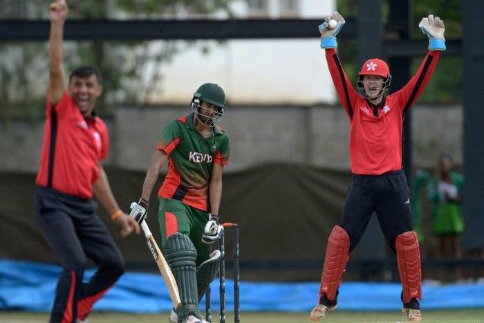 Hong Kong bowler Ehsan Khan (L) and wicket-keeper James Carter (R) unsuccessfuly appeal for Kenya's batsman Irfan Karim (L) to be dismissed for leg before wicket (lbw) during the ICC World Cricket League Kenya vs Hong Kong on November 18, 2016