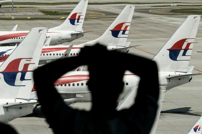 A Malaysia Airlines flight was forced to return to Melbourne to land after a "disruptive" passenger on board claimed he was carrying a bomb