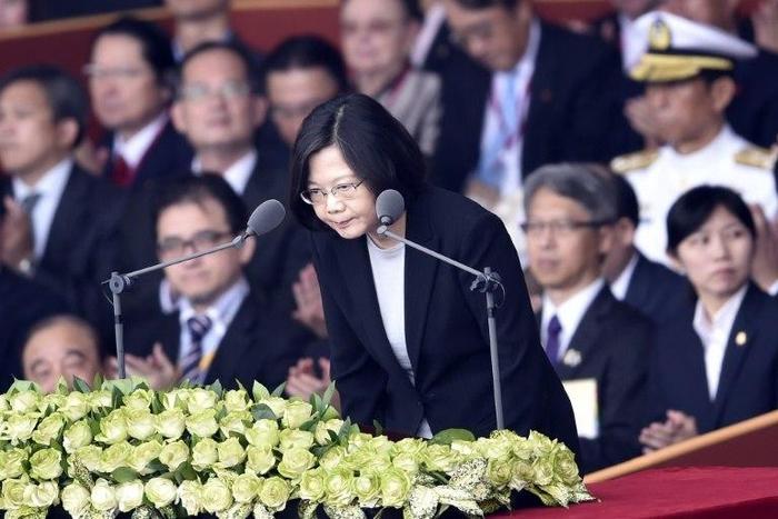 China has called on Washington to block Taiwan President Tsai Ing-wen (C) passing through the US en route to Central America next month