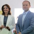 Malta's Prime Minister Joseph Muscat and his wife Michelle Muscat prepare to vote at a polling station in his home town of Burmarrad on June 3, 2017