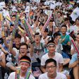 Same-sex activists cheered, hugged and wept outside the parliament in Taipei as they celebrated the landmark decision