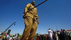 Sudan's President Omar al-Bashir appears during a rally with his supporters in Khartoum on January 9, 2019 as protests calling for an end to his three decades in power rock the country