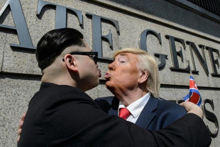 Impersonators of North Korean leader Kim Jong-Un and US President Donald Trump pose outside the US consulate in Hong Kong on January 25, 2017