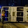 Five women and nine men were injured when a Hong Kong tram flipped over in the city's financial district in the early hours of Thursday