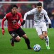 Shanghai SIPG midfielder Oscar (right) in action during the AFC Champions League match against and Urawa Red Diamonds in Saitama, on April 11, 2017