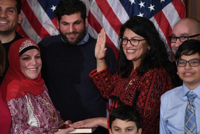 US House Representative Rashida Tlaib (D-MI), takes the oath of office on Thomas Jefferson's English-translated Koran, with family members present in a ceremonial swearing-in at the start of the 116th Congress January 3, 2019
