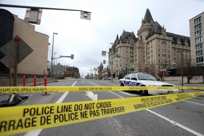 A young man stabbed two female students at their high school in western Canada, killing one and wounding the other