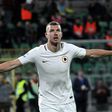 Roma's forward from Bosnia-Herzegovina Edin Dzeko celebrates after scoring during the Italian Serie A football match Palermo vs AS Roma, on March 12, 2017