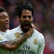 Real Madrid's Isco (R) is congratulated by Marcelo after scoring a goal during the Spanish league football match against Real Sporting de Gijon on April 15, 2017