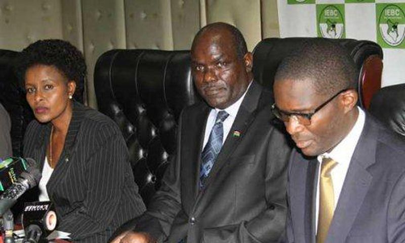 Independent Electoral and Boundaries Commission (IEBC) Chairman Wafula Chebukati (centre) Chief Executive Officer Ezra Chiloba(right) and commissioner Consolata Nkatha Bucha during a past press briefing at the IEBC offices in Nairobi.