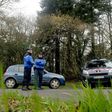 French gendarm block the access to a road, where a healthcare card in the name of Charlotte Troadec has been discovered by a runner on March 1, 2017, in Dirinon, some 20 km east of Brest, western of France