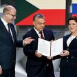 (L-R) Prime ministers of the Czech Republic (Bohuslav Sobotka), Hungary (Viktor Orban), Poland (Beata Szydlo) and Slovakia (Robert Fico) display the signed Warsaw declaration after a meeting on March 28, 2017