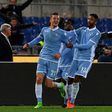 Lazio's midfielder Sergej Milinkovic-Savic (L) scored once in both legs of the Italian Cup semi-final