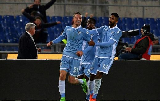 Lazio's midfielder Sergej Milinkovic-Savic (L) scored once in both legs of the Italian Cup semi-final
