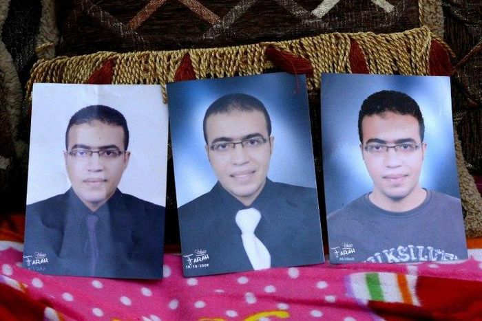 Portraits of Abdallah El-Hamahmy, the Egyptian suspected of attacking soldiers at Paris's Louvre museum, are placed on a sofa at the family home in the Nile delta city of Mansura, Egypt