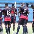 Harambee Stars Players with their coach Stanley Okumbi