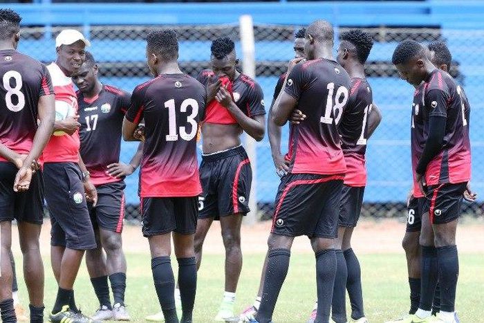 Harambee Stars Players with their coach Stanley Okumbi