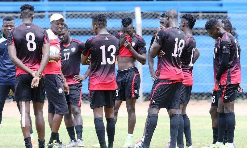Harambee Stars Players with their coach Stanley Okumbi