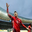 Bayern Munich's Robert Lewandowski celebrates after scoring a last minute equaliser against Hertha Berlin on February 18, 2017