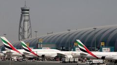 FILE PHOTO: Emirates Airlines aircrafts are seen at Dubai International Airport, United Arab Emirates May 10, 2016.