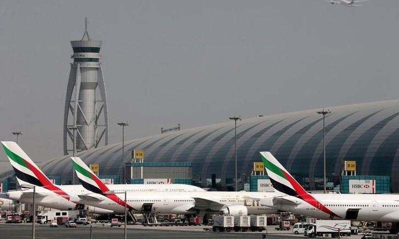 FILE PHOTO: Emirates Airlines aircrafts are seen at Dubai International Airport, United Arab Emirates May 10, 2016.