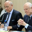 UN Special Envoy for Syria Staffan de Mistura (R) attends a meeting of Intra-Syria peace talks with Syrian government delegation at the Palais des Nations in Geneva on February 25, 2017