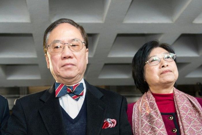 Wearing his customary suit and bow tie, former Hong Kong chief executive Donald Tsang (L) is set to hear the High Court jury's verdict in his corruption trial