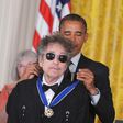 Bob Dylan, whose new album "Triplicate" comes out March 31, is shown here receiving the Presidential Medal of Freedom during a 2012 White House ceremony