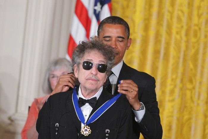 Bob Dylan, whose new album "Triplicate" comes out March 31, is shown here receiving the Presidential Medal of Freedom during a 2012 White House ceremony