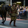 An Australian soldier walks with his horse in the Anzac Day parade in Sydney on April 25, 2017