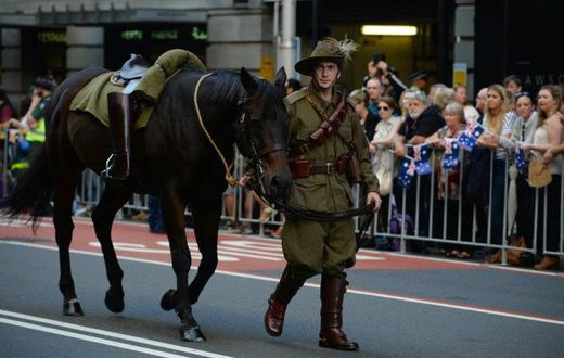 An Australian soldier walks with his horse in the Anzac Day parade in Sydney on April 25, 2017