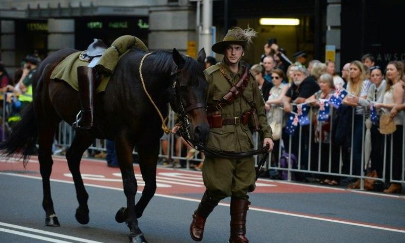 An Australian soldier walks with his horse in the Anzac Day parade in Sydney on April 25, 2017
