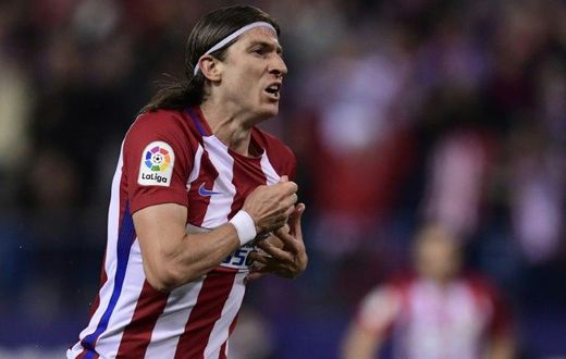 Atletico Madrid's defender Filipe Luis celebrates after scoring during the Spanish league football match Club Atletico de Madrid vs Real Sociedad at the Vicente Calderon stadium in Madrid on April 4, 2017