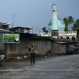 Government troops patrol a deserted street near the position of Islamic militants in Marawi, on the southern island of Mindanao on May 27, 2017