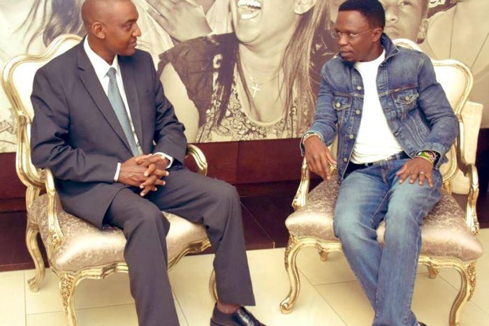 Ababu Namwamba trolled after dressing like “Awilo Longomba” for South Africa trip