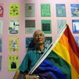This picture taken on May 19, 2017 shows Taiwanese gay rights campaigner Chi Chia-wei, 59, posing for a photograph with a flag during an exhibition in Taipei