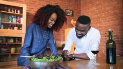 Couple in kitchen(Video Blocks)