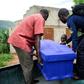 Relatives prepare to bury a guard of King Charles Wesley Mumbere of the Rwenzururu kingdom after clashes with security forces leave scores dead