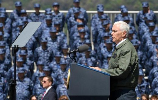 US Vice President Mike Pence ramped up the rhetoric as he stood on the deck of the USS Ronald Reagan, pledging an "overwhelming" response to any North Korean attack