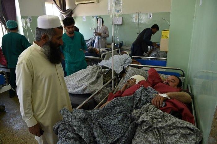 Afghans wounded in a truck bombing receive treatment at a hospital in Kabul. The bomb, hidden in a sewage tanker, killed at least 90 people and wounded hundreds